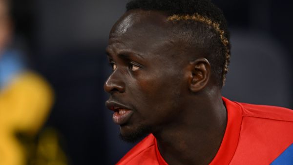 Bayern Munich's Senegalese striker Sadio Mane takes his seat on the bench ahead of kick-off in the UEFA Champions League quarter final, first leg football match between Manchester City and Bayern Munich at the Etihad Stadium in Manchester, north-west England, on April 11, 2023. (Photo by Paul ELLIS / AFP)