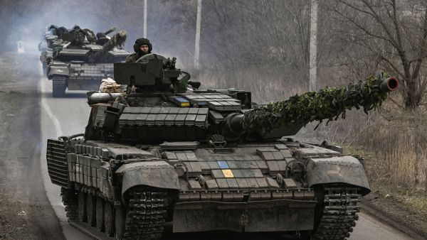 Ukrainian T64 tanks move towards Bakhmut direction, in Donetsk Oblast region, on March 20, 2023. (Photo by Aris Messinis / AFP) Leopard 1s tanks