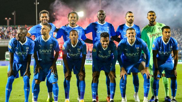 The starting eleven of Saudi Arabia's Al-Hilal pose for a group photo before the start of their 2023 Arab Club Champions Cup group B football match against Libya's Al-Ahli Tripoli at the Prince Sultan bin Abdul Aziz Stadium in Abha on July 27, 2023. (Photo by AFP)