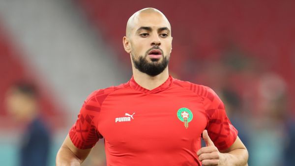 Morocco's midfielder #04 Sofyan Amrabat warms up before the Qatar 2022 World Cup quarter-final football match between Morocco and Portugal at the Al-Thumama Stadium in Doha on December 10, 2022. (Photo by KARIM JAAFAR / AFP)