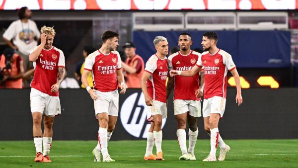 Arsenal's Belgian midfielder Leandro Trossard (3L) celebrates scoring his team's fourth goal during a pre-season friendly football match between Arsenal FC and FC Barcelona at SoFi Stadium in Inglewood, California, on July 26, 2023. (Photo by Patrick T. Fallon / AFP)