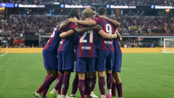 FC Barcelona celebrate on the field after Ousmane Dembélé #7 of FC Barcelona scored a goal during the first half of the pre-season friendly match against Real Madrid at AT&T Stadium on July 29, 2023 in Arlington, Texas. Sam Hodde/Getty Images/AFP (Photo by Sam Hodde / GETTY IMAGES NORTH AMERICA / Getty Images via AFP)