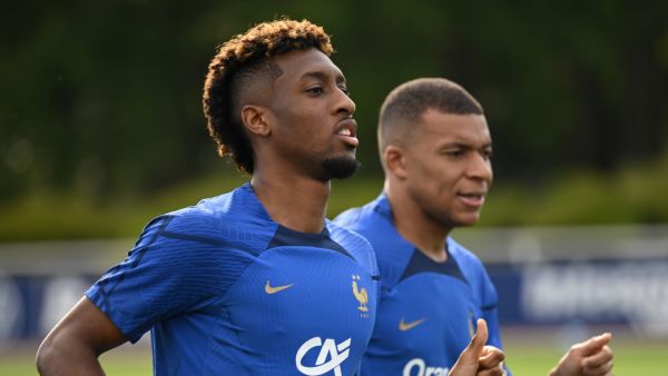 France's forward Kingsley Coman (L) and France's forward Kylian Mbappe during a training session ahead of the upcoming UEFA Euro 2024 football tournament qualifying matches, in Clairefontaine-en-Yvelines on June 10, 2023. France will play against Gibraltar on June 16, 2023 and against Greece on June 19, 2023 in their UEFA Euro 2024 Group B Qualification matches. (Photo by Bertrand GUAY / AFP)