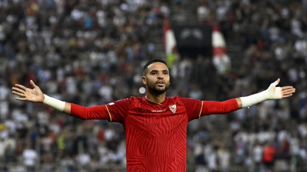 Sevilla's Moroccan forward #15 Youssef En-Nesyri celebrates scoring his team's first goal during the 2023 UEFA Super Cup football match between Manchester City and Sevilla at the Georgios Karaiskakis Stadium in Piraeus on August 16, 2023. (Photo by Aris MESSINIS / AFP)