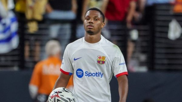 Ansu Fati #10 of FC Barcelona holds the ball at the end of a preseason friendly match against AC Milan during the 2023 Soccer Champions Tour at Allegiant Stadium on August 01, 2023 in Las Vegas, Nevada. FC Barcelona defeated AC Milan 1-0. Ethan Miller/Getty Images/AFP (Photo by Ethan Miller / GETTY IMAGES NORTH AMERICA / Getty Images via AFP)