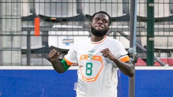 Ivory Coast's midfielder Franck Kessie celebrates after scoring a goal during the international friendly football match between Ivory-Coast and Togo at The Diochon Stadium in Le Petit-Quevilly, Normandy, on September 24, 2022. (Photo by Lou BENOIST / AFP)