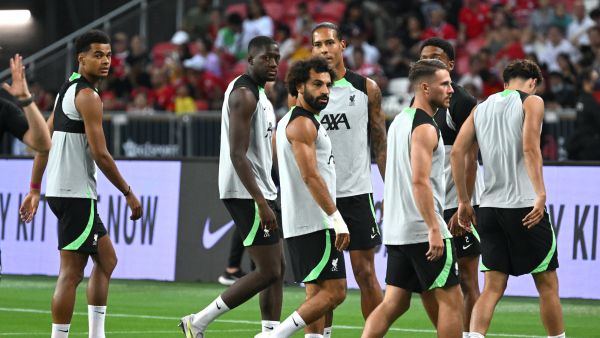 Liverpool's Egyptian striker Mohamed Salah (C) along with teammates attends a training session at the Singapore Festival of Football in Singapore on July 29, 2023. (Photo by Mohd RASFAN / AFP)