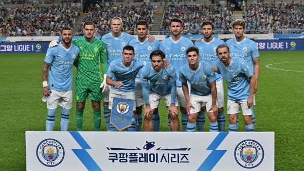 Manchester City's players pose for a team photo prior to their friendly football match between Manchester City and Atletico Madrid at Seoul World Cup Stadium in Seoul on July 30, 2023. (Photo by Jung Yeon-je / AFP)
