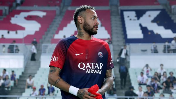 Paris Saint-Germain's Neymar Jr looks on as he enters the stadium before the friendly football match between France's Paris Saint-Germain and Saudi Arabia's Al-Nassr at Nagai Stadium in Osaka on July 25, 2023. (Photo by PAUL MILLER / AFP)