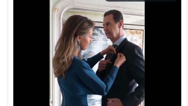 اسماء تجهز زوجها الرئيس الاسد قبيل مأدبة الغداء مع الرئيس الصيني