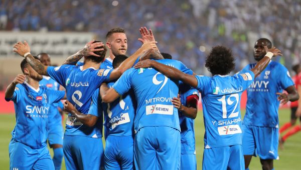 Hilal's players celebrate a goal during the Saudi Pro League football match between Al-Hilal and Al-Riyadh at Prince Faisal Bin Fahd Stadium in Riyadh on September 15, 2023. (Photo by Abdullah Mahdi / AFP)