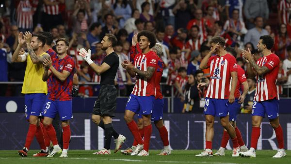 Atletico Madrid players celebrate their win at the end of the Spanish Liga football match between Club Atletico de Madrid and Real Madrid CF at the Metropolitano stadium in Madrid on September 24, 2023. (Photo by OSCAR DEL POZO / AFP)