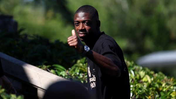 France's forward Ousmane Dembele gives a thumbs up as he arrives in Clairefontaine-en-Yvelines on September 4, 2023 as part of the team's preparation for upcoming UEFA Euro 2024 football tournament qualifying matches. France will play against Ireland on September 7, 2023, in the Group B of Euro 2024 qualifiers. (Photo by FRANCK FIFE / AFP)
