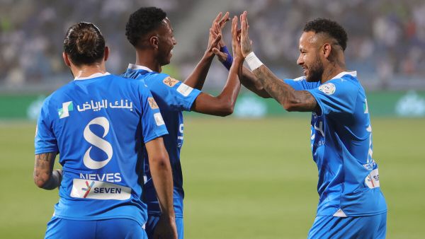 Hilal's Brazilian forward #10 Neymar (R) congratulates Hilal's Saudi midfielder #16 Nasser al-Dawsari for his goal during the Saudi Pro League football match between Al-Hilal and Al-Riyadh at Prince Faisal Bin Fahd Stadium in Riyadh on September 15, 2023. (Photo by Fayez Nureldine / AFP)