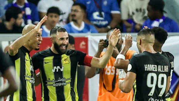 Ittihad's French forward #09 Karim Benzema (2nd-L) celebrates after a goal during the Saudi Pro League football match between Al-Ittihad and Al-Hilal at Prince Abdullah al-Faisal Stadium in Jeddah on September 1, 2023. (Photo by AFP)