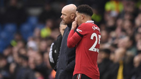 Manchester United's English striker Jadon Sancho (R) speaks with Manchester United's Dutch manager Erik ten Hag (L) during the English Premier League football match between Leeds United and Manchester United at Elland Road in Leeds, northern England on February 12, 2023. (Photo by Oli SCARFF / AFP) 