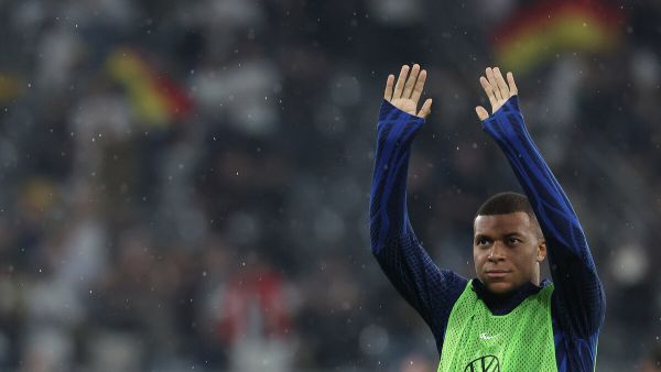 France's forward #10 Kylian Mbappe waves after the friendly football match between Germany and France the Signal Iduna Park stadium in Dortmund, western Germany, on September 12, 2023. (Photo by FRANCK FIFE / AFP)