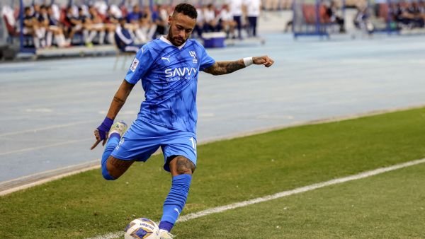 Hilal's Brazilian forward #10 Neymar shoots a corner kick during the AFC Champions League Group D football match between Al-Hilal and PFC Navbahor Namangan at King Fahd International Stadium in Riyadh on September 18, 2023. (Photo by Fayez Nureldine / AFP)