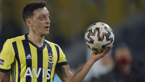 Fenerbahce's German midfielder Mesut Ozil reacts during the Turkish Super League (Super Lig) football match between Fenerbahce S.K. and Galatasaray S.K. at The Sukru Saracoglu Stadium in Istanbul on February 6, 2021. (Photo by Kenan Asyali / POOL / AFP)