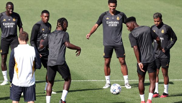 (From L) Real Madrid's French defender #23 Ferland Mendy, Real Madrid's Austrian defender #04 David Alaba, Real Madrid's French midfielder #12 Eduardo Camavinga, Real Madrid's English midfielder #5 Jude Bellingham, Real Madrid's French defender #18 Aurelien Tchouameni and Real Madrid's Brazilian forward #11 Rodrygo attend a training session on the eve of the UEFA Champions League football match between Real Madrid and Union Berlin at Valdebebas Sport City in Madrid on September 19, 2023. (Photo by Thomas CO