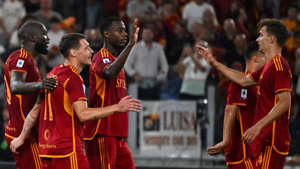 Roma's Belgian forward #90 Romelu Lukaku (L) celebrates with teammates after scoring his team's sixth goal during the Italian Serie A football match between AS Roma and Empoli at the Olympic stadium in Rome on September 17, 2023. (Photo by Andreas SOLARO / AFP)