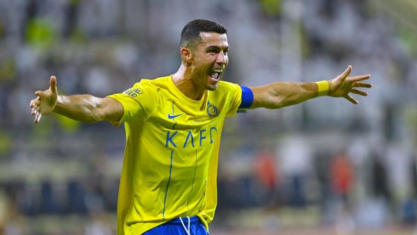 Nassr's Portuguese forward #07 Cristiano Ronaldo celebrates after scoring during the Saudi Pro League football match between Al-Nassr and Al-Fateh at the Prince Abdullah Bin Jalawi Stadium in al-Hasa, on August 25, 2023. (Photo by Ali Al-HAJI / AFP)