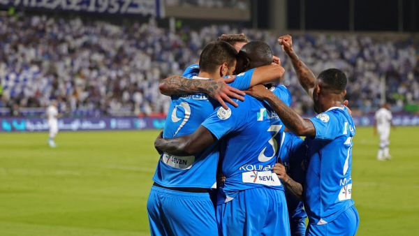Hilal's Senegalese defender #03 Kalidou Koulibaly celebrates with his teammates after scoring the first goal during the Saudi Pro League football match between Al-Hilal and Al-Shabab at Prince Faisal Bin Fahd Stadium in Riyadh on September 29, 2023. (Photo by Fayez Nureldine / AFP)