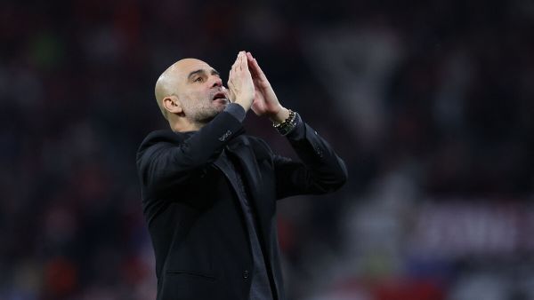 Manchester City's Spanish manager Pep Guardiola blows kisses after the UEFA Champions League Group G football match between RB Leipzig and Manchester City in Leipzig, eastern Germany on October 4, 2023. (Photo by Ronny HARTMANN / AFP)