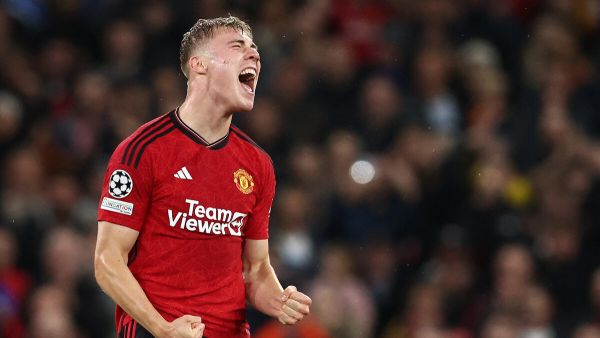 Manchester United's Danish striker #11 Rasmus Hojlund celebrates scoring the opening goal during the UEFA Champions league group A football match between Manchester United and Galatasaray at Old Trafford stadium in Manchester, north west England, on October 3, 2023. (Photo by Darren Staples / AFP)