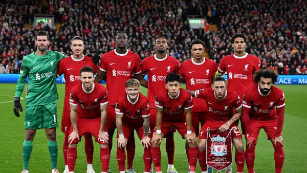pose for a team photo ahead of kikc off in the UEFA Europa League group E football match between Liverpool and Royale Union Saint-Gilloise at Anfield in Liverpool, north west England on October 5, 2023. (Photo by Oli SCARFF / AFP)
