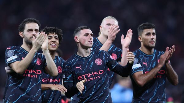 Manchester City's players applaud after the UEFA Champions League Group G football match between RB Leipzig and Manchester City in Leipzig, eastern Germany on October 4, 2023. (Photo by Ronny HARTMANN / AFP)