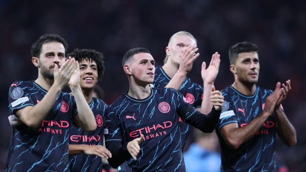 Manchester City's players applaud after the UEFA Champions League Group G football match between RB Leipzig and Manchester City in Leipzig, eastern Germany on October 4, 2023. (Photo by Ronny HARTMANN / AFP)