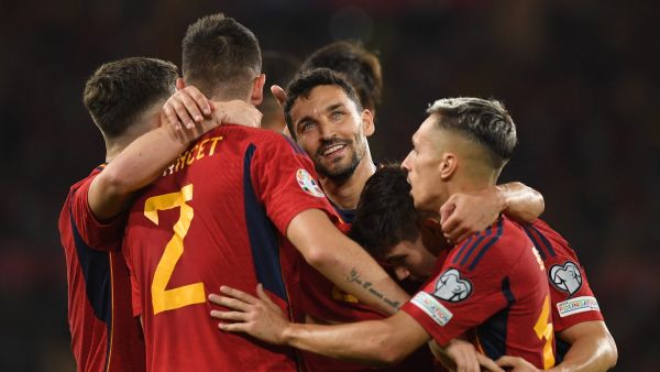 Spain's players celebrate their team's second goal during the EURO 2024 first round group A qualifying football match between Spain and Scotland at the La Cartuja stadium in Seville on October 12, 2023. (Photo by JORGE GUERRERO / AFP)