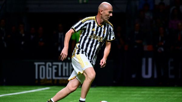 Juventus' former French player Zinedine Zidane plays a football match during the "Together, a Black & White Show" event, the first Juventus party dedicated to all its fans, at the Pala Alpitour in Turin, on October 10, 2023. (Photo by MARCO BERTORELLO / AFP)