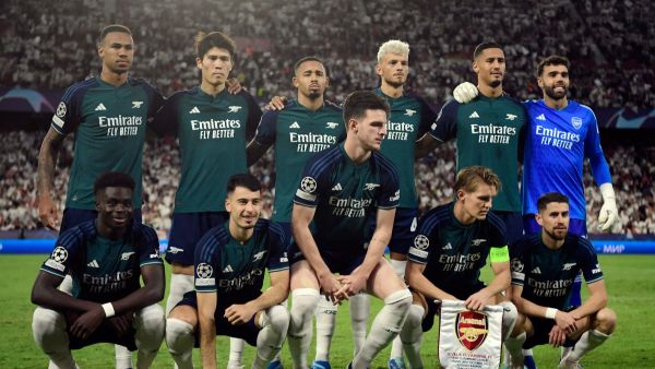 Arsenal players pose before the UEFA Champions League 1st round day 3 Group B football match between Sevilla FC and Arsenal at the Ramon Sanchez Pizjuan stadium in Seville on October 24, 2023. (Photo by CRISTINA QUICLER / AFP)