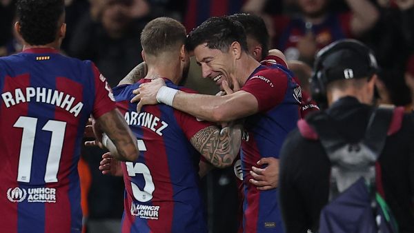 Barcelona's Polish forward #09 Robert Lewandowski celebrates scoring his team's second goal during the Spanish league football match between FC Barcelona and Deportivo Alaves at the Estadi Olimpic Lluis Companys in Barcelona on November 12, 2023. (Photo by LLUIS GENE / AFP)