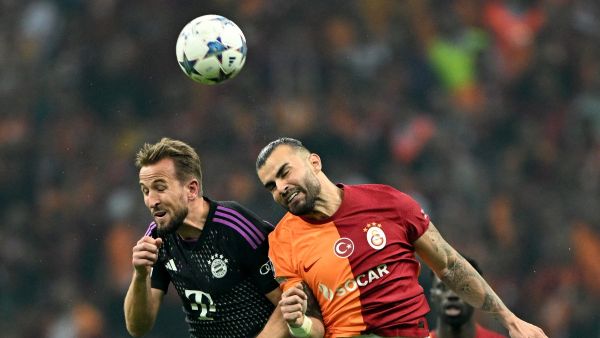 Bayern Munich's English forward #09 Harry Kane (L) vies with Galatasaray's Turkish defender #42 Abdulkerim Bardakci (R) during the UEFA Champions League group stage football match between Galatasaray and Bayern Munich at the Ali Sami Yen Spor Kompleksi in Istanbul on October 24, 2023. (Photo by OZAN KOSE / AFP)