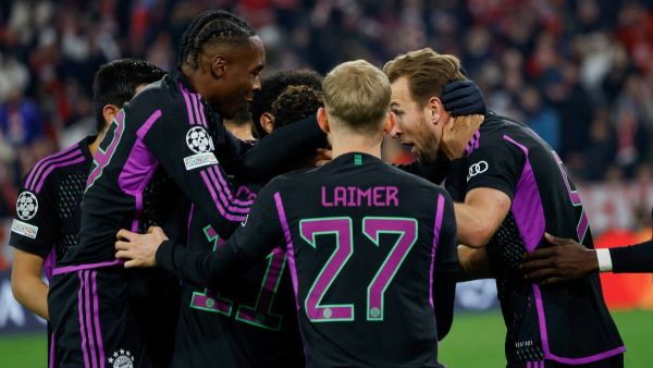 Bayern Munich's English forward #09 Harry Kane (R) celebrates scoring the opening goal with his teammates during the UEFA Champions League Group A football match between FC Bayern Munich and Galatasaray AS in Munich, southern Germany on November 8, 2023. (Photo by MICHAELA REHLE / AFP)