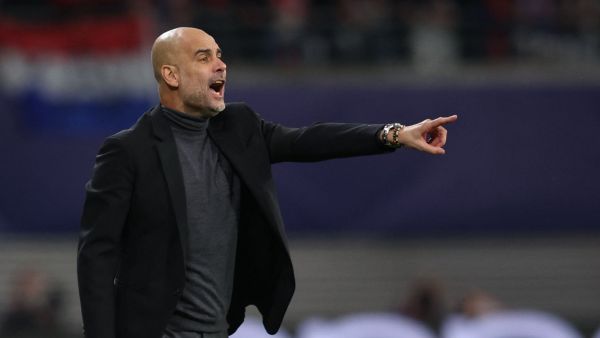 Manchester City's Spanish manager Pep Guardiola gestures during the UEFA Champions League Group G football match between RB Leipzig and Manchester City in Leipzig, eastern Germany on October 4, 2023. (Photo by Ronny HARTMANN / AFP)