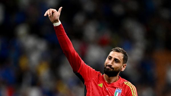 Italy's goalkeeper #01 Gianluigi Donnarumma celebrates after winning during the Euro 2024 football tournament group C qualifying match between Italy and Ukraine, at Stadio San Siro in Milan, on September 12, 2023. (Photo by GABRIEL BOUYS / AFP)