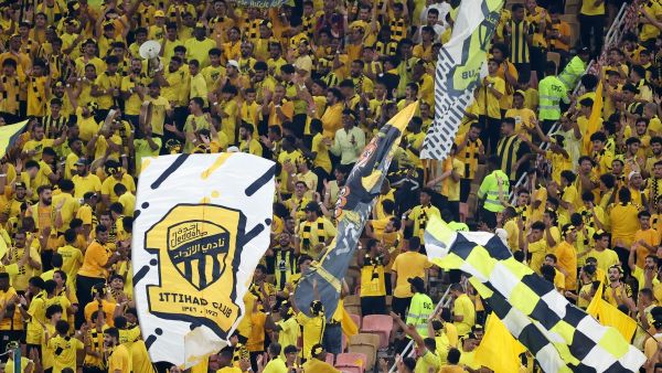 Ittihad fans cheer ahead of the AFC Champions League Group C football match between Saudi's Al-Ittihad and Iraq's Al-Quwa Al-Jawiya at the King Abdullah Sports City in Jeddah on October 23, 2023. (Photo by AFP)