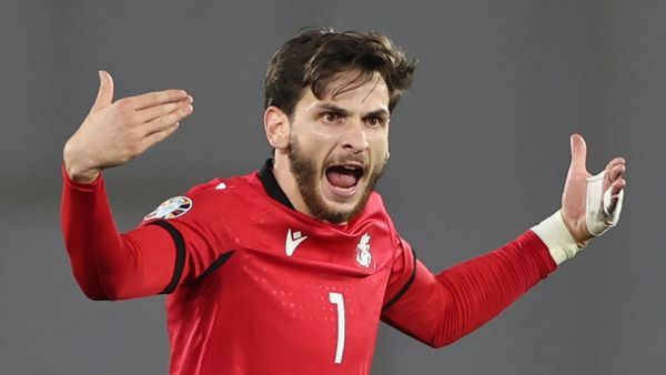 Georgia's midfielder #07 Khvicha Kvaratskhelia celebrates after scoring the team's first goal during the UEFA Euro 2024 football tournament Group A qualifying match between Georgia and Scotland in Tbilisi on November 16, 2023. (Photo by Giorgi ARJEVANIDZE / AFP)