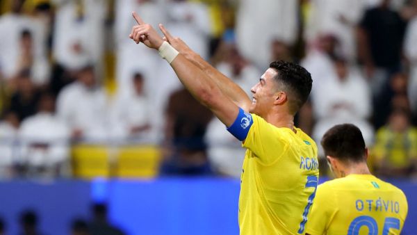 Nassr's Portuguese forward #07 Cristiano Ronaldo celebrates after scoring a goal during the AFC Champions League Group E football match between Saudi's al-Nassr and Qatar’s al-Duhail at the King Saud University Stadium in Riyadh on October 24, 2023. (Photo by Fayez NURELDINE / AFP)