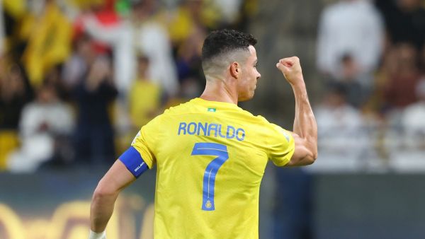 Nassr's Portuguese forward #07 Cristiano Ronaldo celebrates after scoring their second goal during the Saudi Pro League football match between Al-Nassr and Damac at the King Saud University Stadium in Riyadh on October 21, 2023. (Photo by Fayez NURELDINE / AFP)