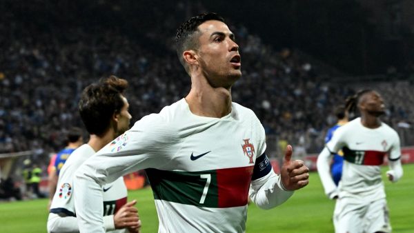 Portugal's forward #07 Cristiano Ronaldo celebrates scoring the team's first goal during the UEFA Euro 2024 Group J qualification football match Bosnia-Herzegovina v Portugal at the 'Bilino Polje' stadium in Zenica, Bosnia-Herzegovina on October 16, 2023. (Photo by Elvis BARUKCIC / AFP)