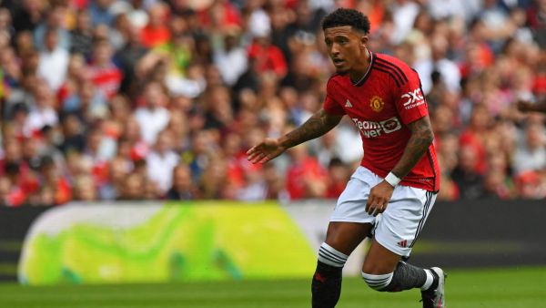 Manchester United's English striker Jadon Sancho runs with the ball during the pre-season friendly football match between Manchester United and Lyon at Murrayfield, in Edinburgh, on July 19, 2023. (Photo by ANDY BUCHANAN / AFP)