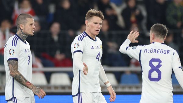 Scotland's midfielder #04 Scott McTominay celebrates with teammates after scoring the team's first goal during the UEFA Euro 2024 football tournament Group A qualifying match between Georgia and Scotland in Tbilisi on November 16, 2023. (Photo by Giorgi ARJEVANIDZE / AFP)