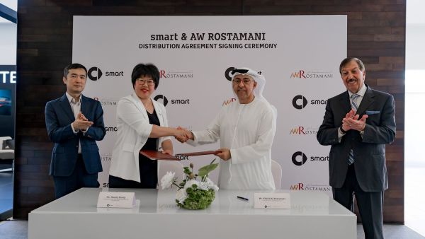 During the event. AW Rostamani Group Partnership with smart to Accelerate Intelligent Electric Mobility in UAE