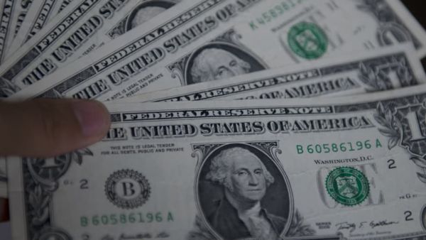 Dollar weakens amid Christmas holiday trading, potential decline in US inflation