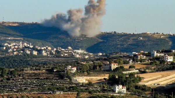 Smoke billows during Israeli bombardment on the outskirts of the border town of Marwahin in southern Lebanon, on December 26, 2023